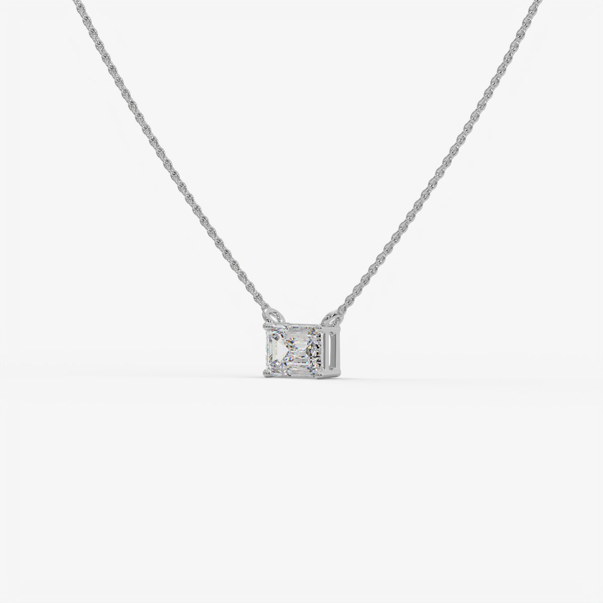 East-West Emerald Cut Diamond Pendant