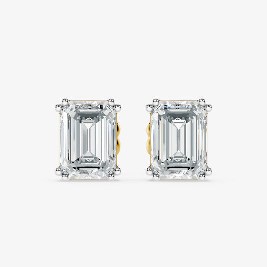 Classic emerald solitaire studs