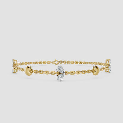 Pear Cut Diamond & Gold Heart Station Bracelet