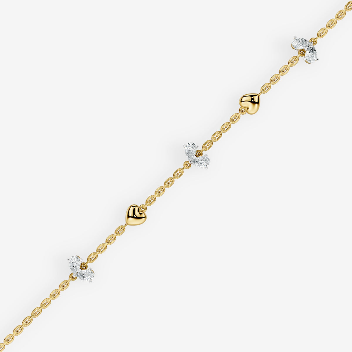 Pear Cut Diamond & Gold Heart Station Bracelet