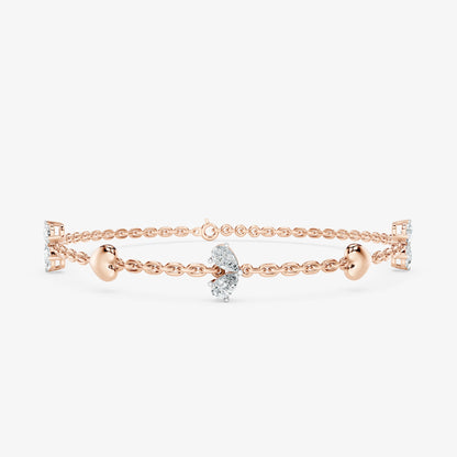 Pear Cut Diamond & Gold Heart Station Bracelet