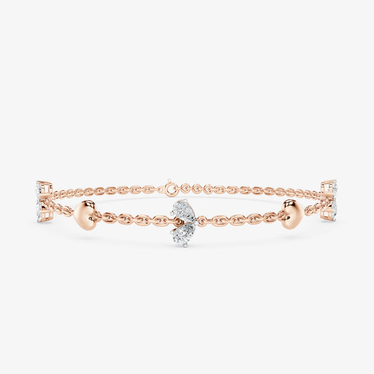 Pear Cut Diamond & Gold Heart Station Bracelet