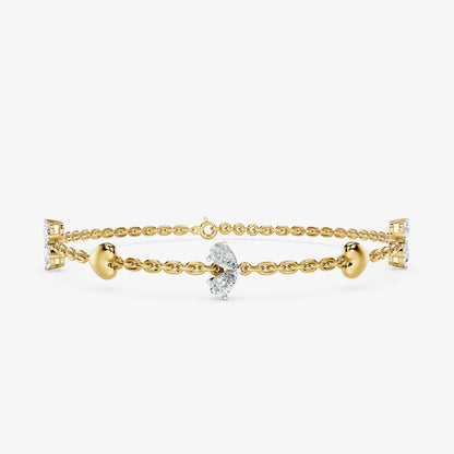Pear Cut Diamond & Gold Heart Station Bracelet