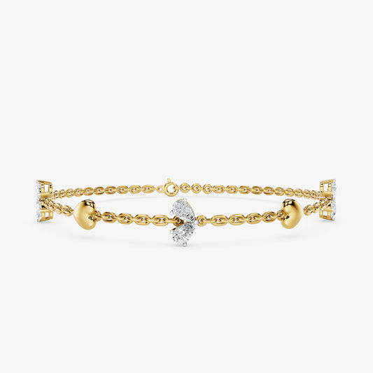 Pear Cut Diamond & Gold Heart Station Bracelet